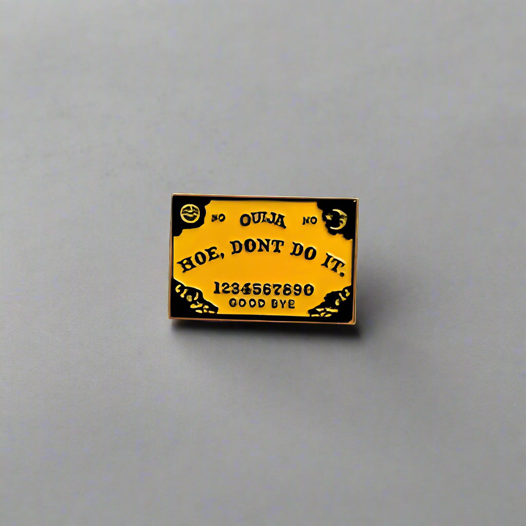 Small yellow and black card with text on a gray surface